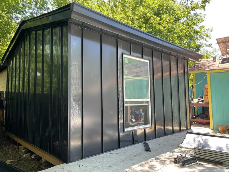 Black standing seam metal wall panels for Roof Inspection in East Lyme