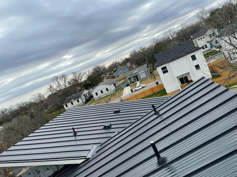 Standing seam metal roof panels with vents for Skylight Repair in East Lyme